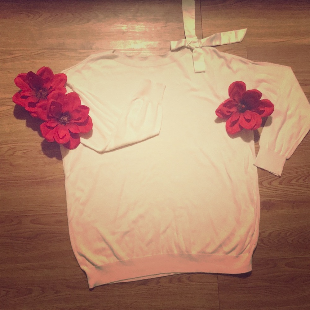 Baby pink long sleeve sweater.